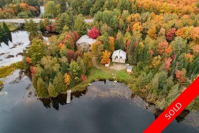 Magnetawan River Waterfront Home for sale with access to 3 lakes! Under $750K