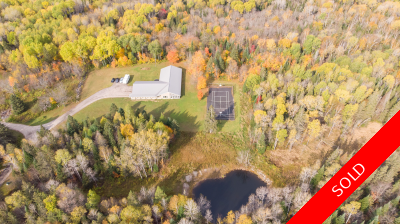 Sprawling ranch bungalow for sale with indoor pool on 9+ acres