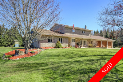 LARGE BRICK FAMILY HOME FOR SALE ON 4 ACRES OFFERING COMPLETE PRIVACY!