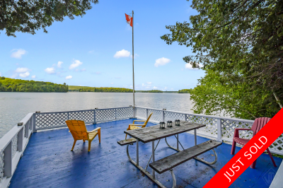 Year round cottage for sale on Three Mile Lake in Katrine with boathouse